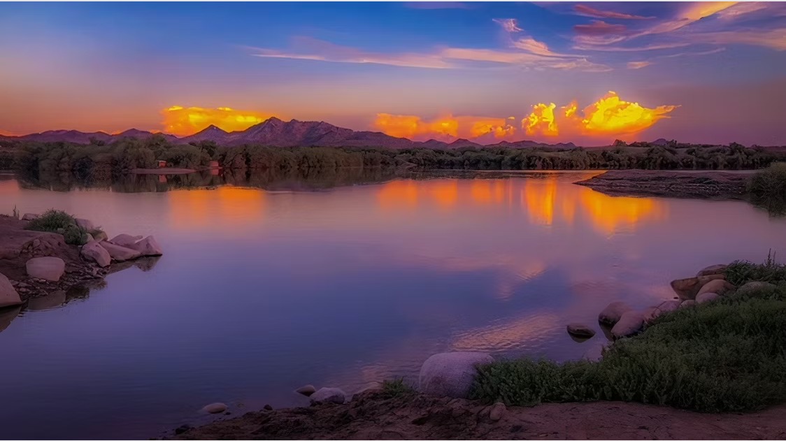 Sunset over the existing 60-acre lake at Hidden Lake